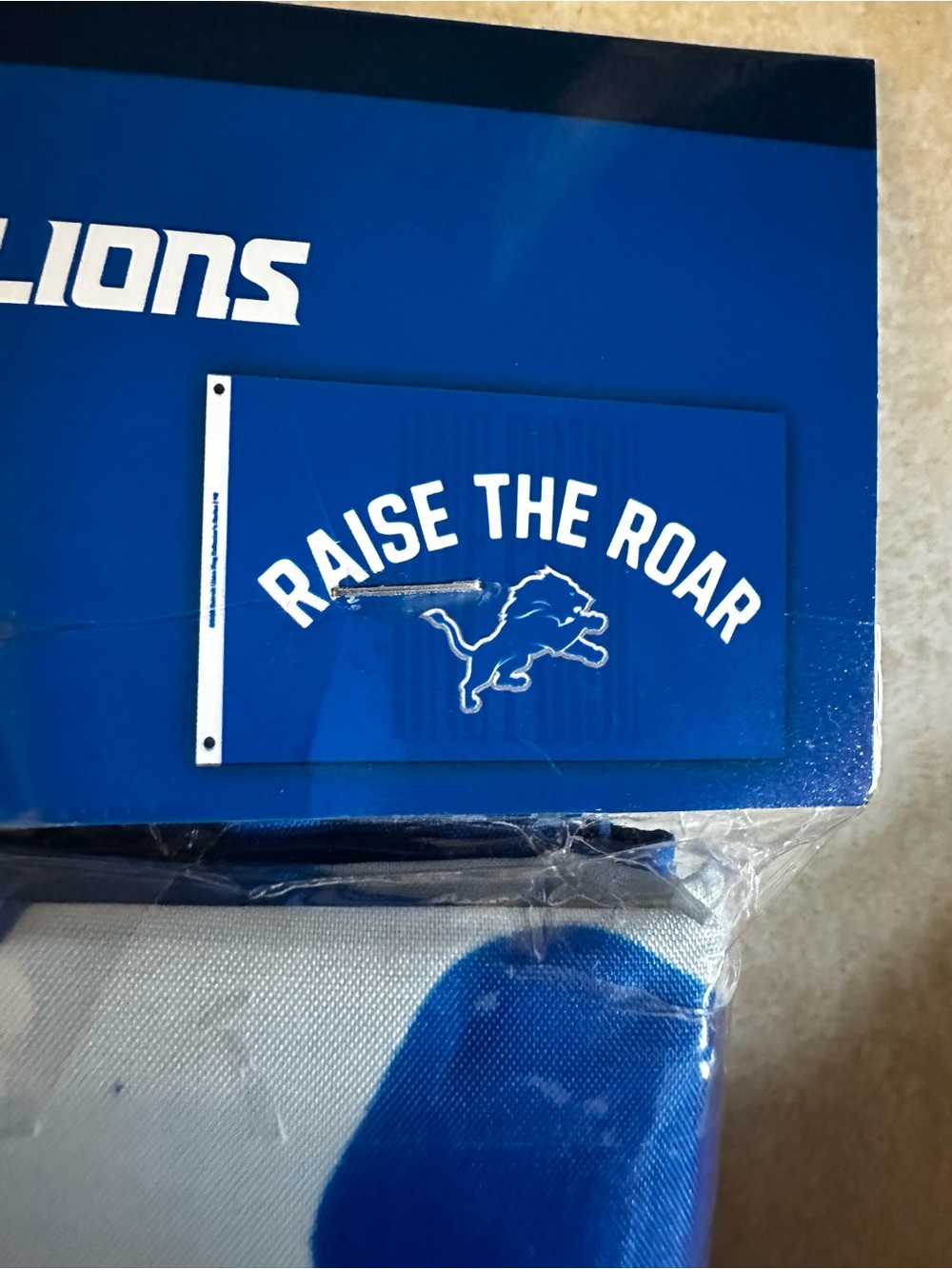NFL Blue and White "Raise The Roar" Banner
